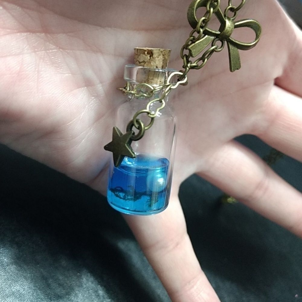 Ocean in a bottle necklace 28"